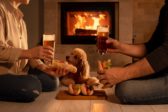 poodle with guest eating withbeer